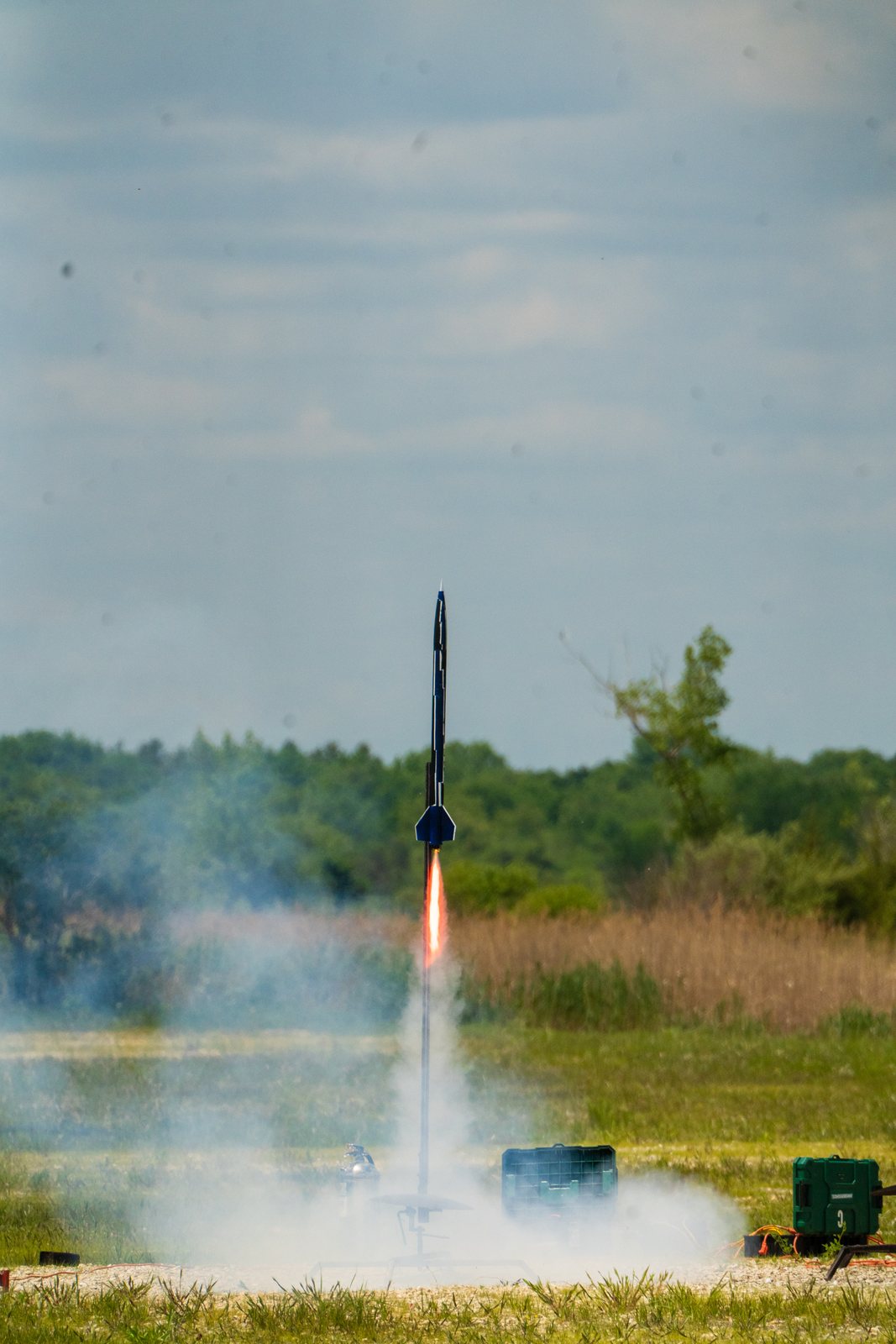 The L1 certification rocket lifting off the pad under H182 power
