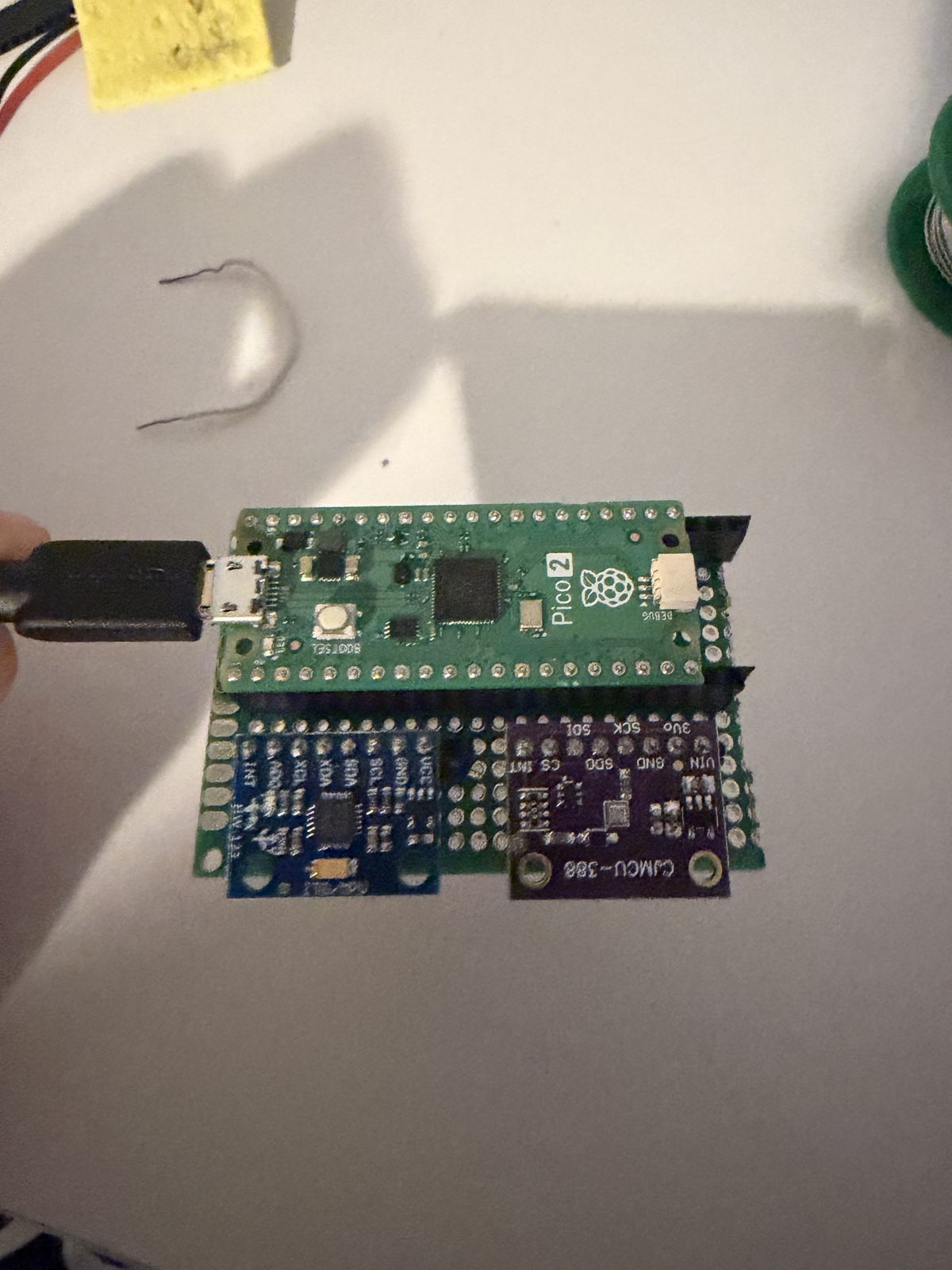 Soldered perfboard flight computer with Pico 2 and socketed sensors